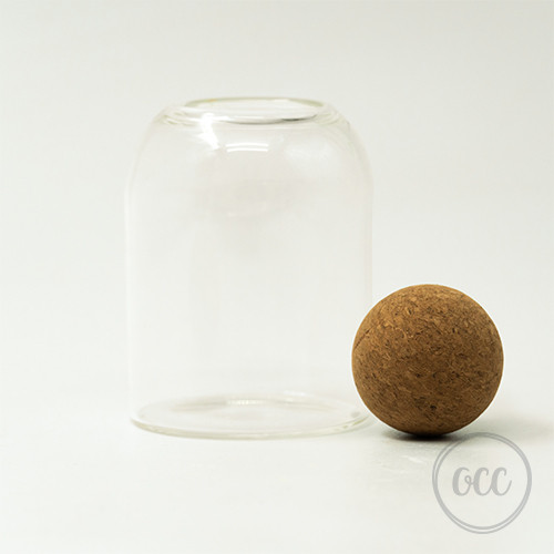 Glass container with round felt lid