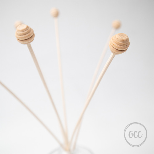 Decorative sticks with small spheres for reed diffusers